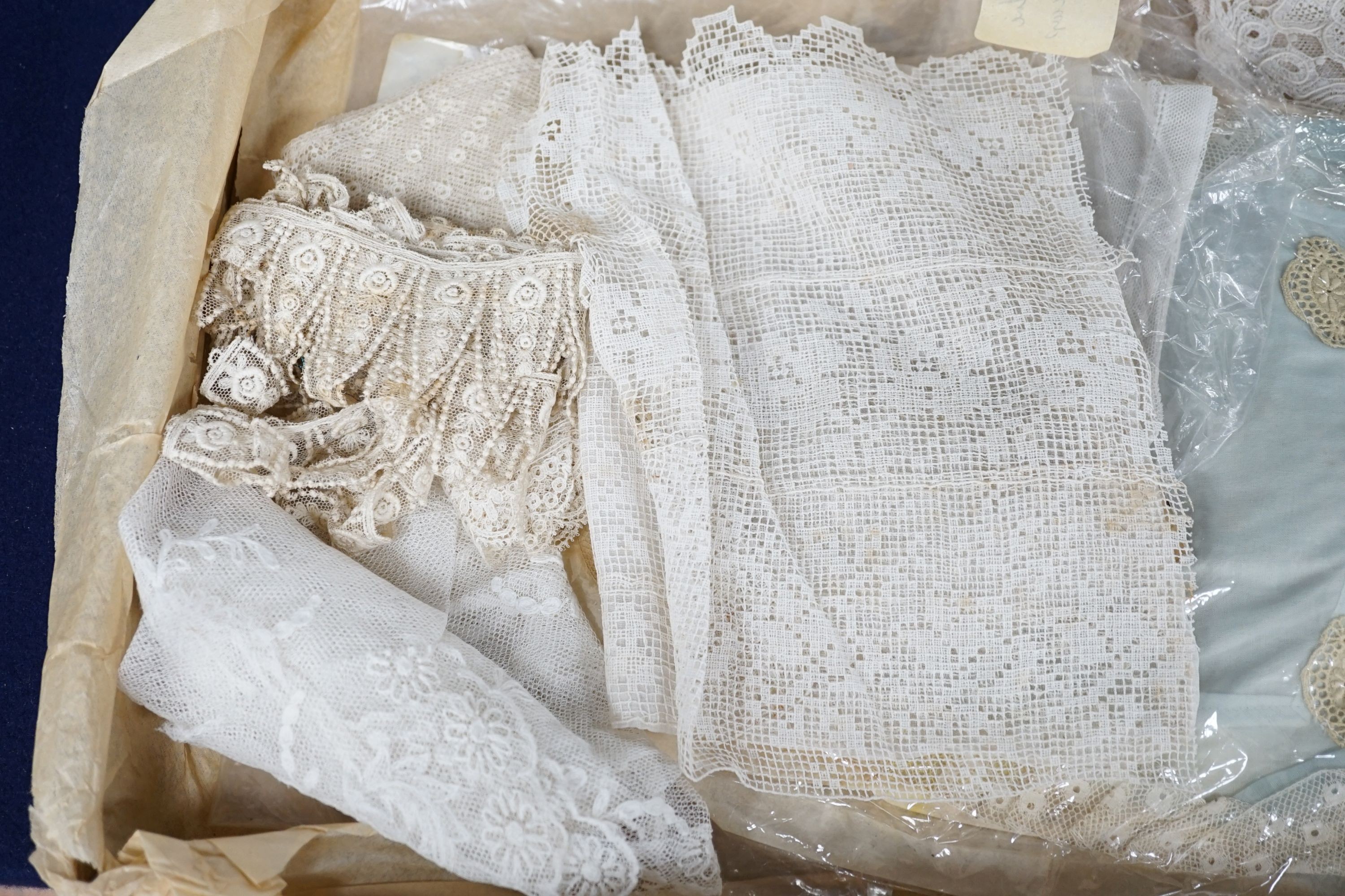 A needle lace skirt panel, a similar stole, various machine laces and trimmings